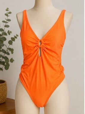 BECCA Bright Orange One-Piece Swimsuit with Ring Detail